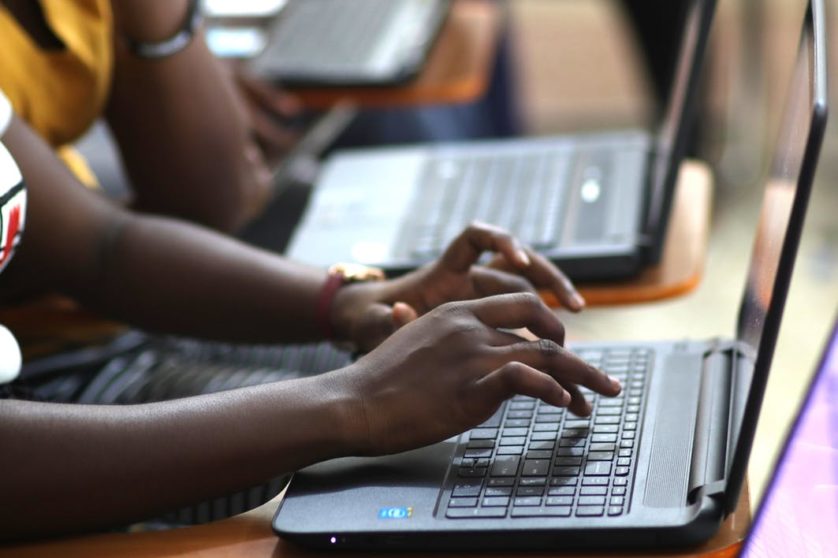 Hands typing on keyboard