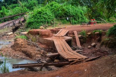 rickety bridge built next to broken bridge