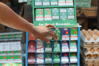 Hand reaching for a cigarettes pack