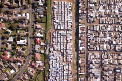 Aerial view of township beside wealthy suburb in South Africa
