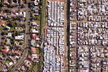 Aerial view of township beside wealthy suburb in South Africa