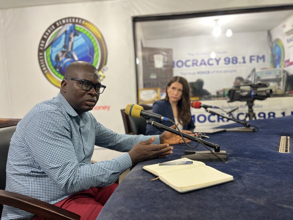 Abu Bakarr Kamara and Vanessa van den Boogaard speaking on Radio Democracy 