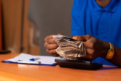 A nigerian man counting money