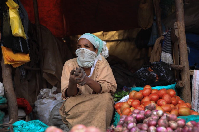 Medium shot of a women selling produce in the Saris market, Ethiopia (2020)