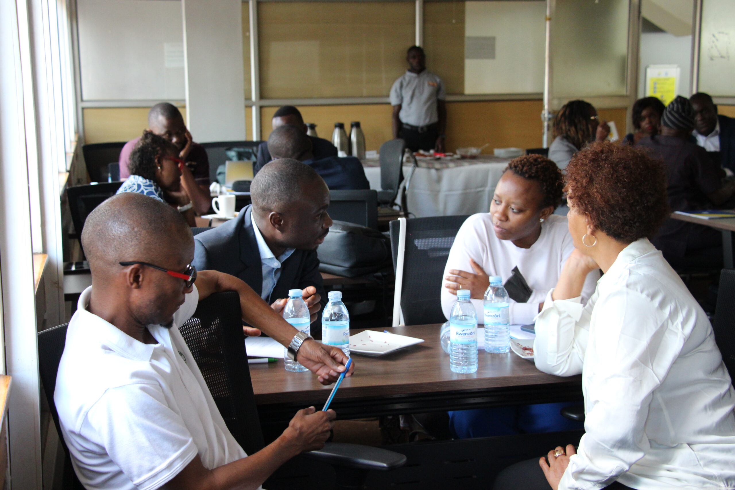 Participants of ICTD's annual Research on Tax and Development course engage in a discussion. ICTD/2022/Kampala, Uganda