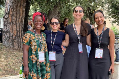 A group photo of Jalia Kangave, Vanessa van den Boogaard, Giulia Mascagni and Sripriya Srivasta at the IAFFE conference in Rome