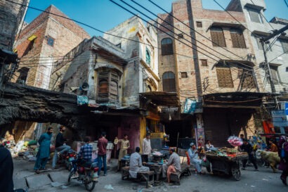 Wide shot of people in a street in Lahore, Pakistan.