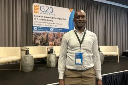 Michael Oloo, tax professional and PhD student at a conference
