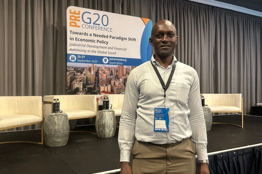 Michael Oloo, tax professional and PhD student at a conference